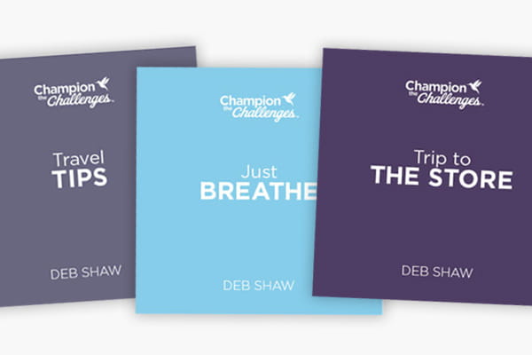 An arrangement of Champion the Challenges™ booklets on travel, breathing and trips to the store.